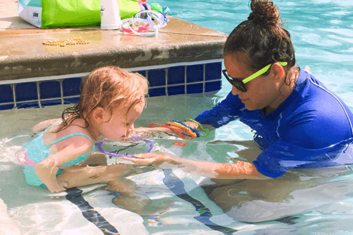 teaching toddlers to swim in your pool (photo)
